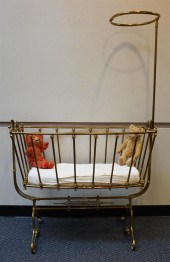 BRASS ROCKING CRADLE ON STANDB