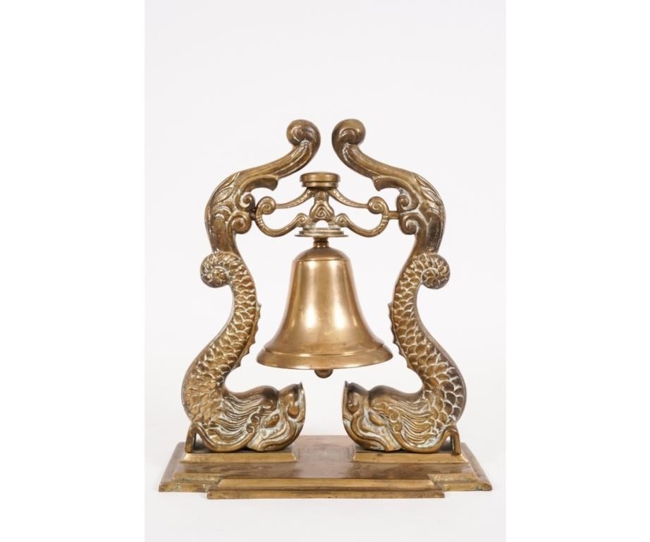 Brass ships bell with dolphin