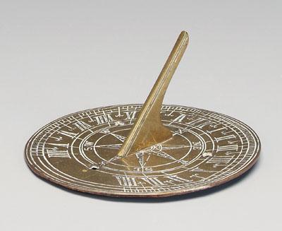 Brass sundial, heavy circular plate