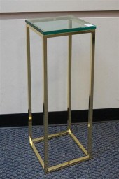 BRASS TONE AND GLASS TOP PEDES