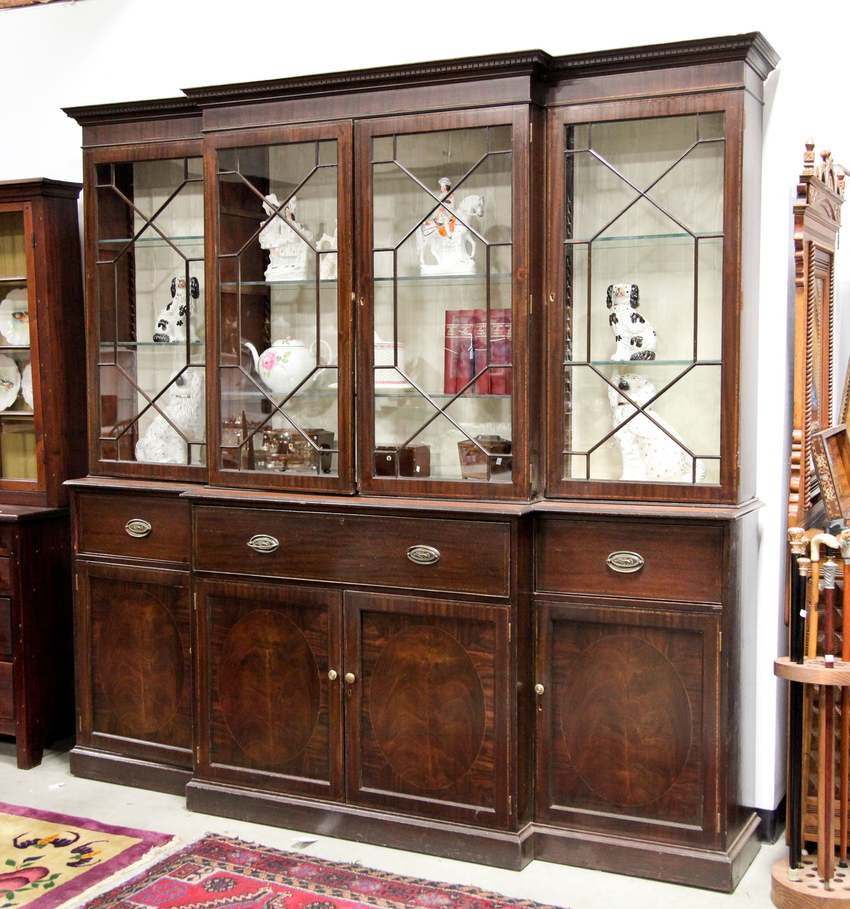 BREAKFRONT SECRETARY BOOKCASE. 
