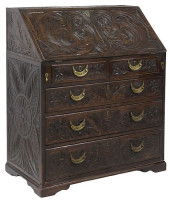 BRITISH HEAVILY CARVED OAK SLA