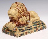 BRITISH POTTERY RECUMBENT LION