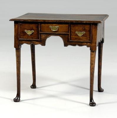 British Queen Anne lowboy, elm