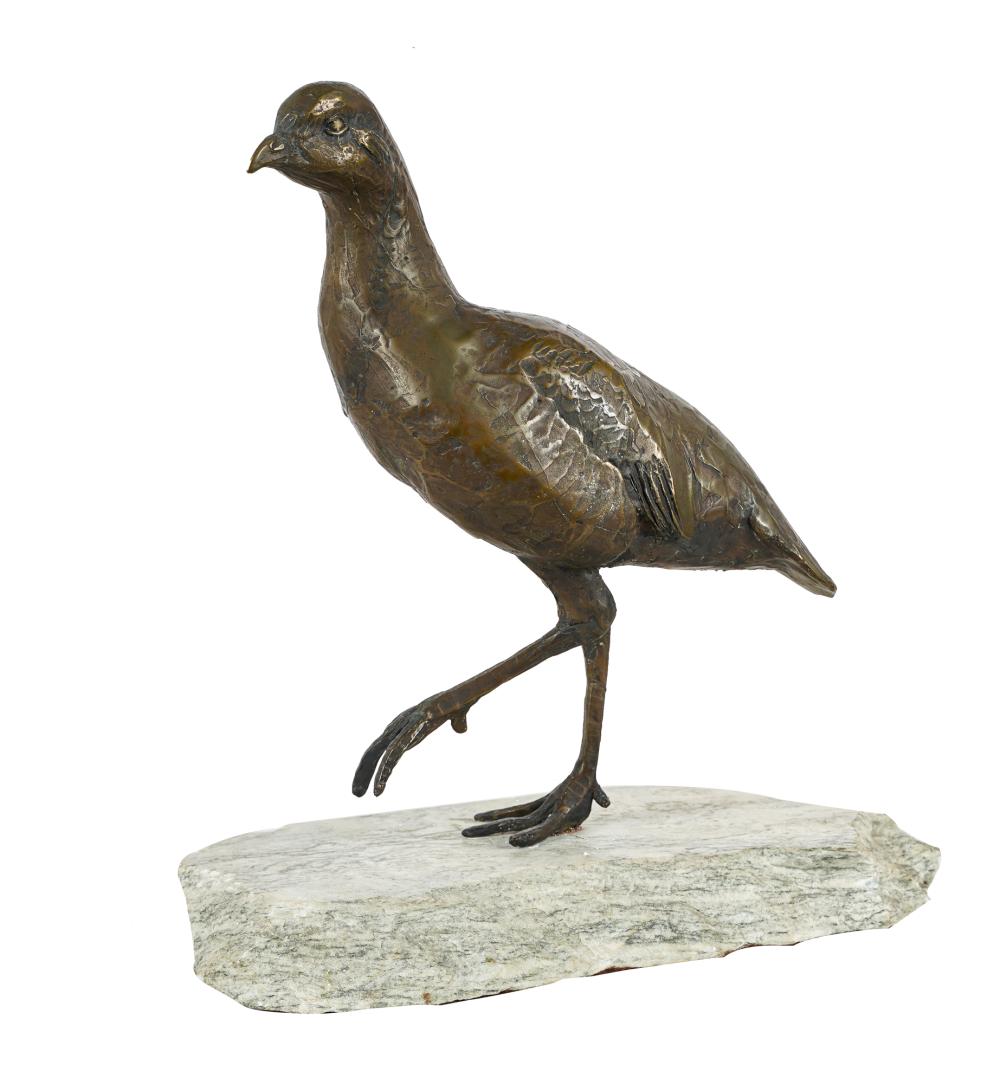 BRONZE BIRDmounted to a stone,