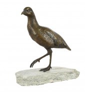 BRONZE BIRDmounted to a stone,