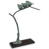 BRONZE BIRDS PERCHED ON BRANCH