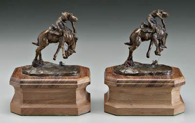 Bronze bookends after C. M.