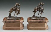 Bronze bookends after C. M. Ru