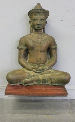 Bronze Buddha on a Lucite Base.From