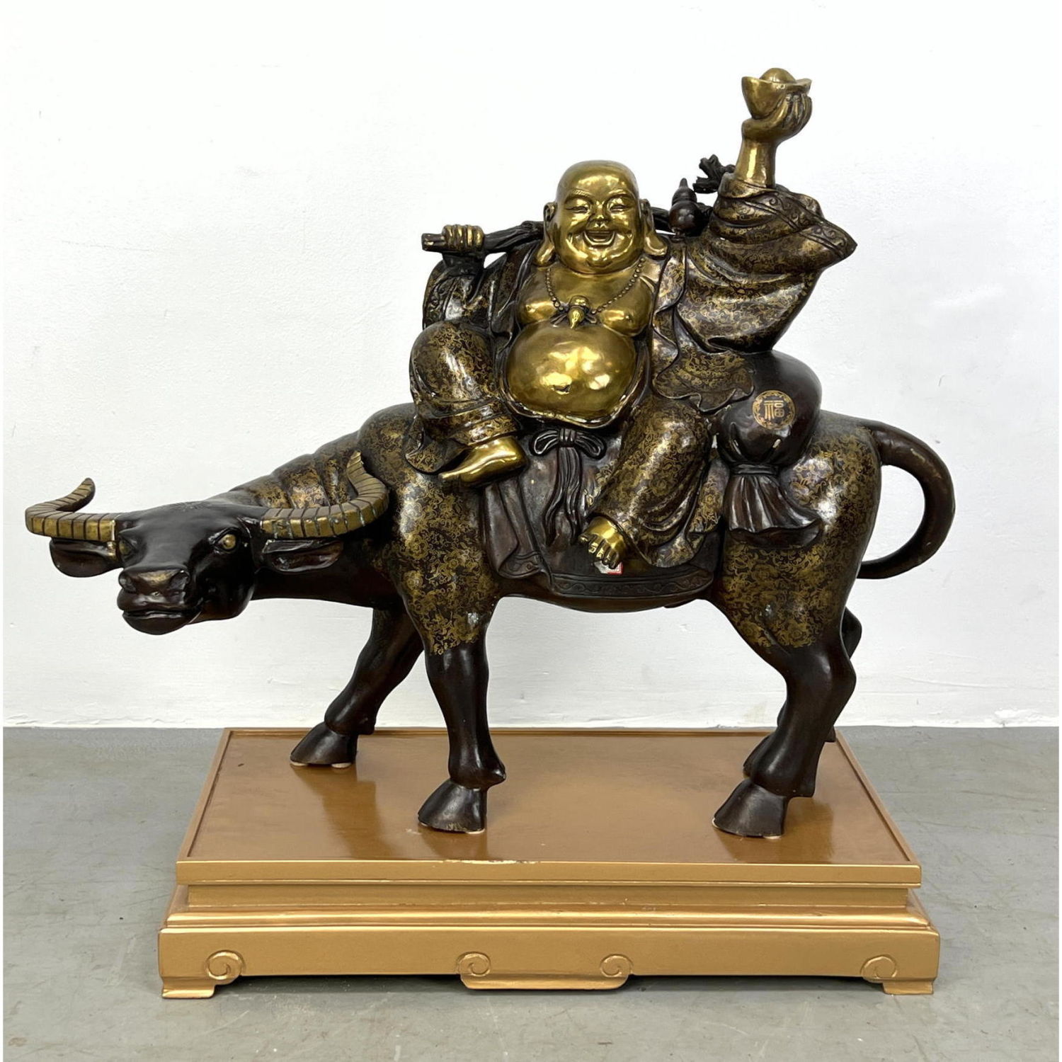Bronze Buddha on Water Buffalo