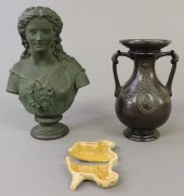 Bronze bust of a young woman,