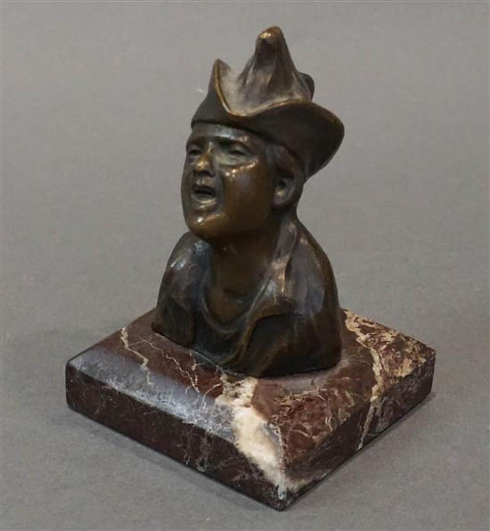 BRONZE BUST OF BOY WEARING HAT ON
