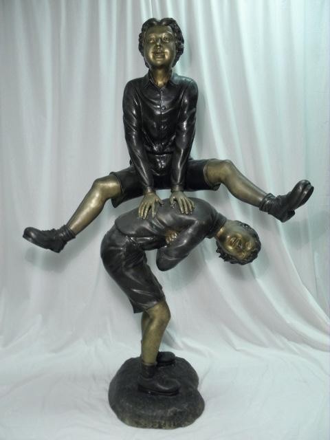 Bronze cast sculpture depicting two