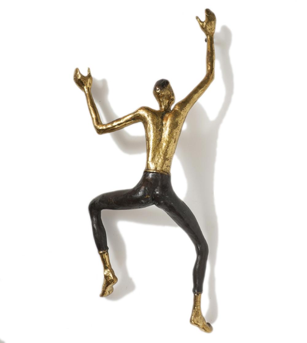 BRONZE 'CLIMBING MAN' WALL