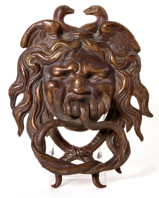 Bronze door knockers probably