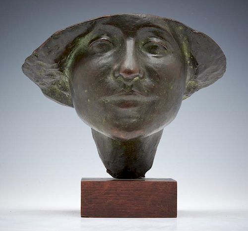 BRONZE FACE OF A WOMAN,