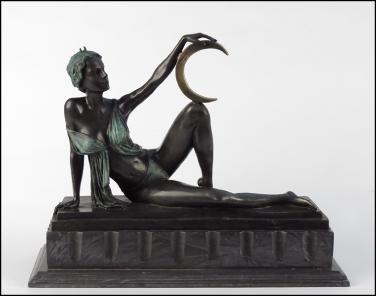BRONZE FEMALE FIGURE. Raised on a