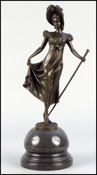 BRONZE FEMALE FIGURE. Raised on 4''
