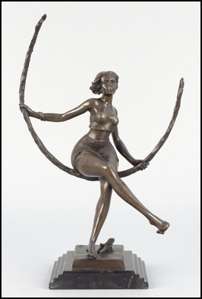 BRONZE FEMALE FIGURE. Signed