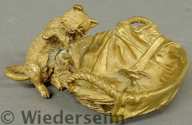 Bronze figural group of a cat and a