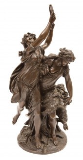 BRONZE FIGURAL GROUP OF "BACCH