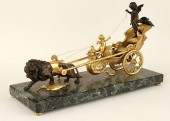 BRONZE FIGURAL GROUP OF PUTTO