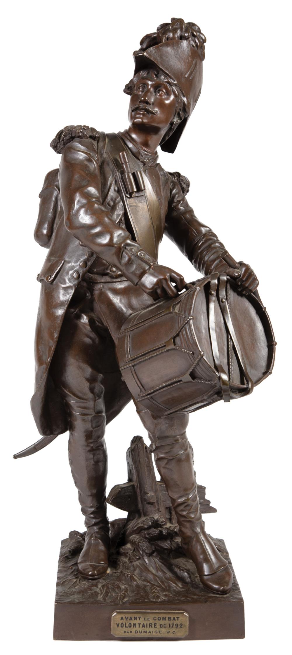 BRONZE FIGURAL GROUP OF SOLDIER