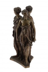 BRONZE FIGURAL GROUP OF "THE T