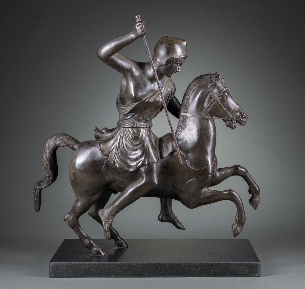 BRONZE FIGURAL GROUP OF "THE LION