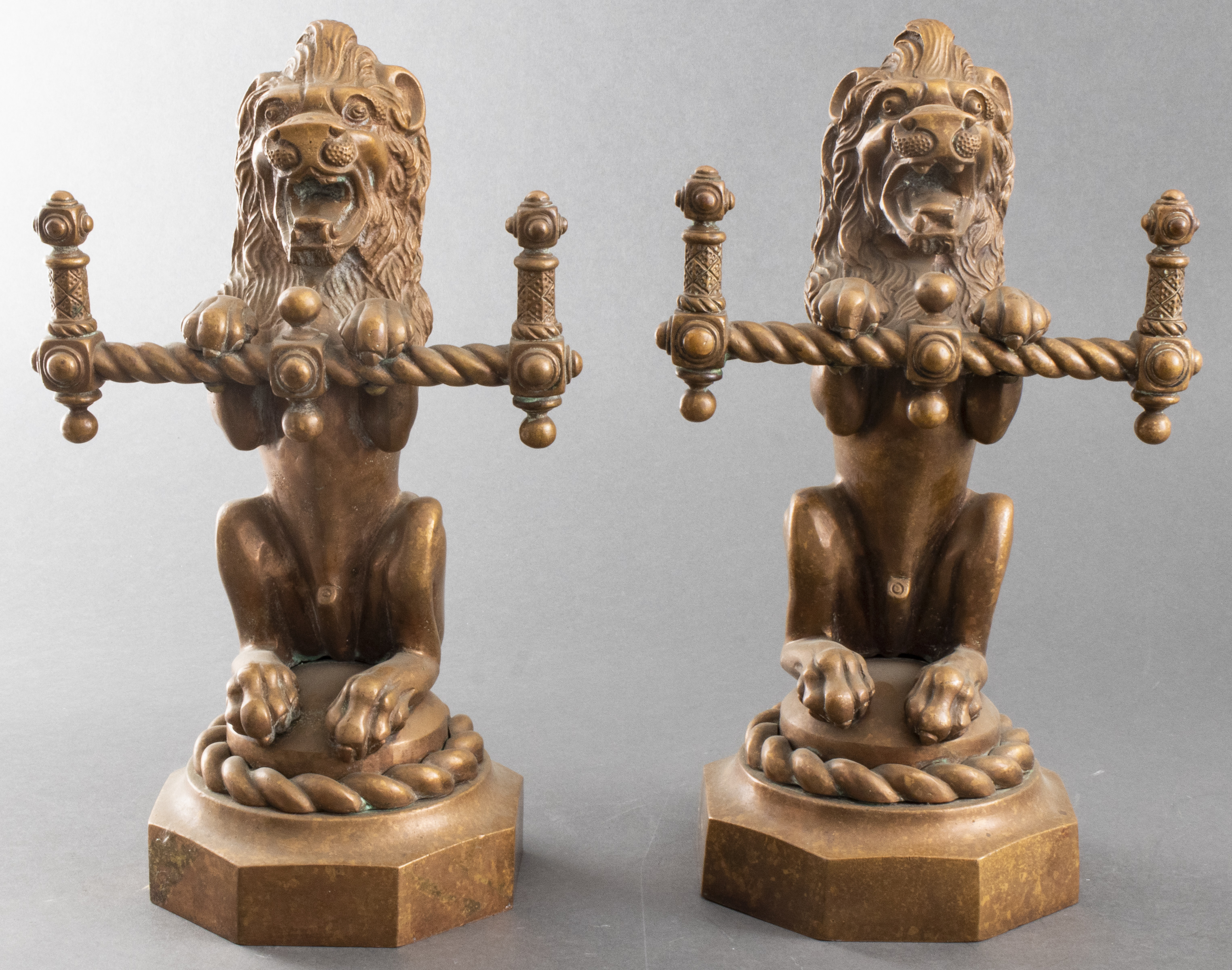 BRONZE FIGURAL ORNAMENTS MODELED AS
