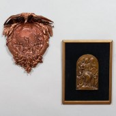 BRONZE FIGURAL PLAQUE OF THE V
