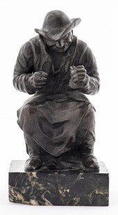 BRONZE FIGURAL SCULPTURE OF A