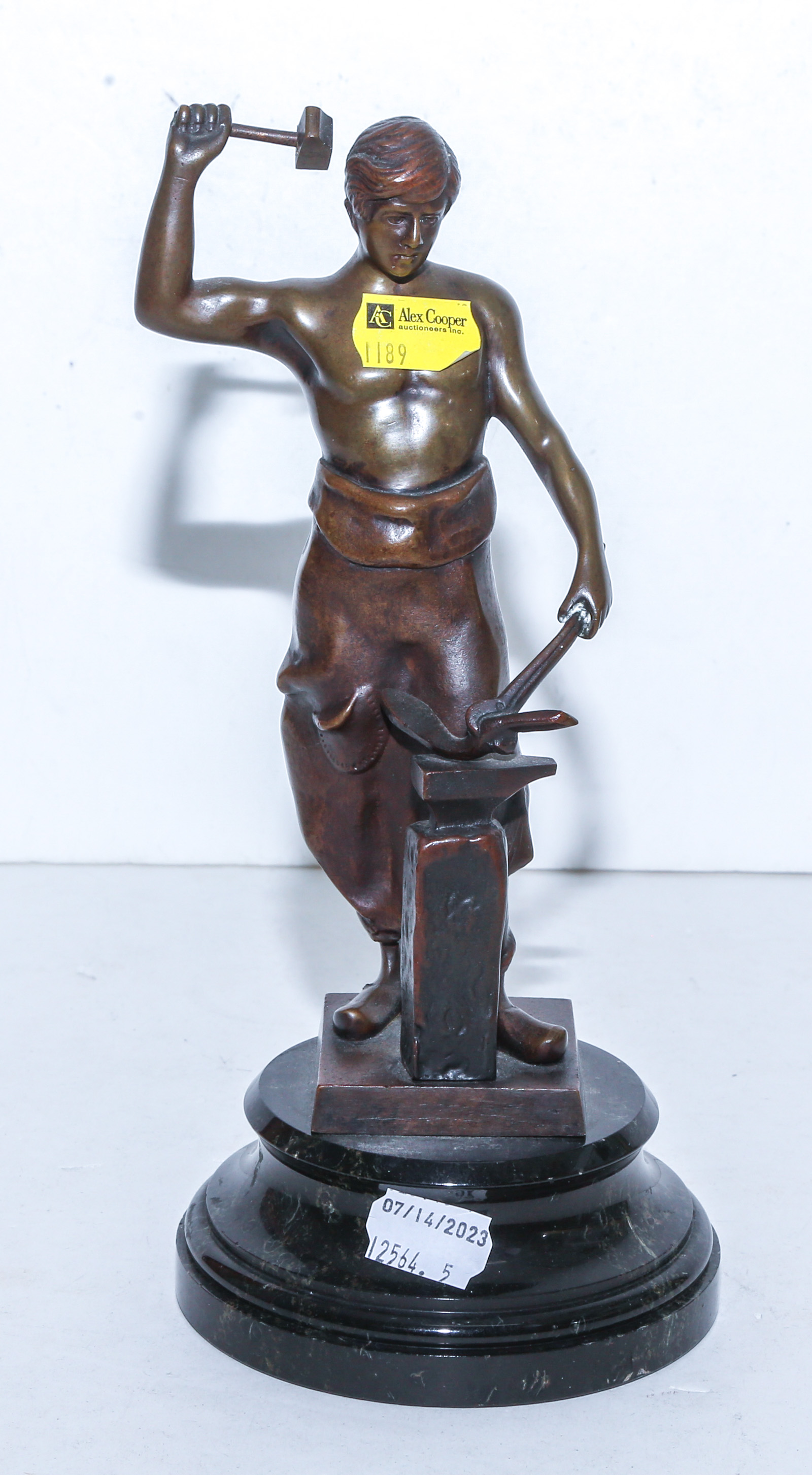 BRONZE FIGURE OF A BLACKSMITH