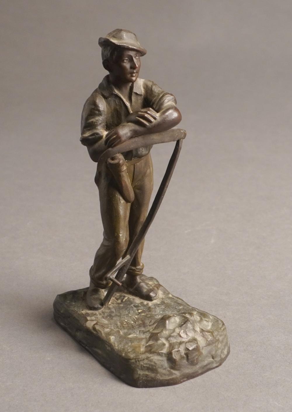 BRONZE FIGURE OF A FARMER, H: 7 IN.