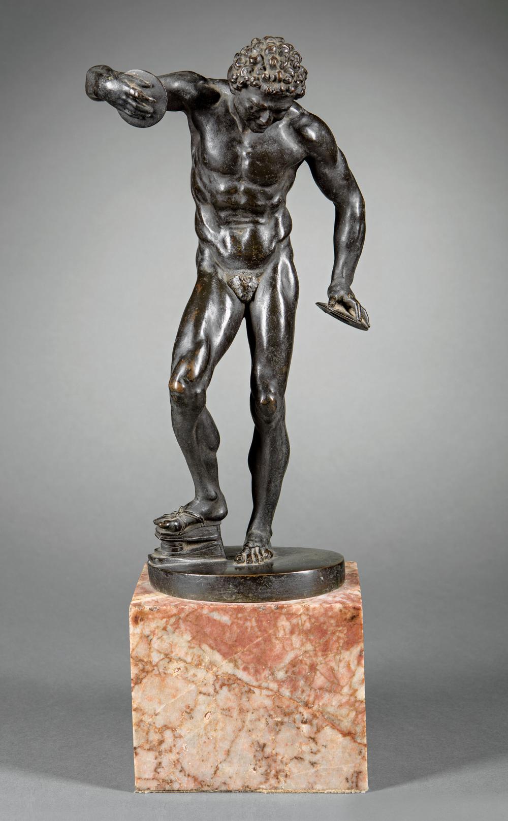 BRONZE FIGURE OF A FAUN PLAYING THE