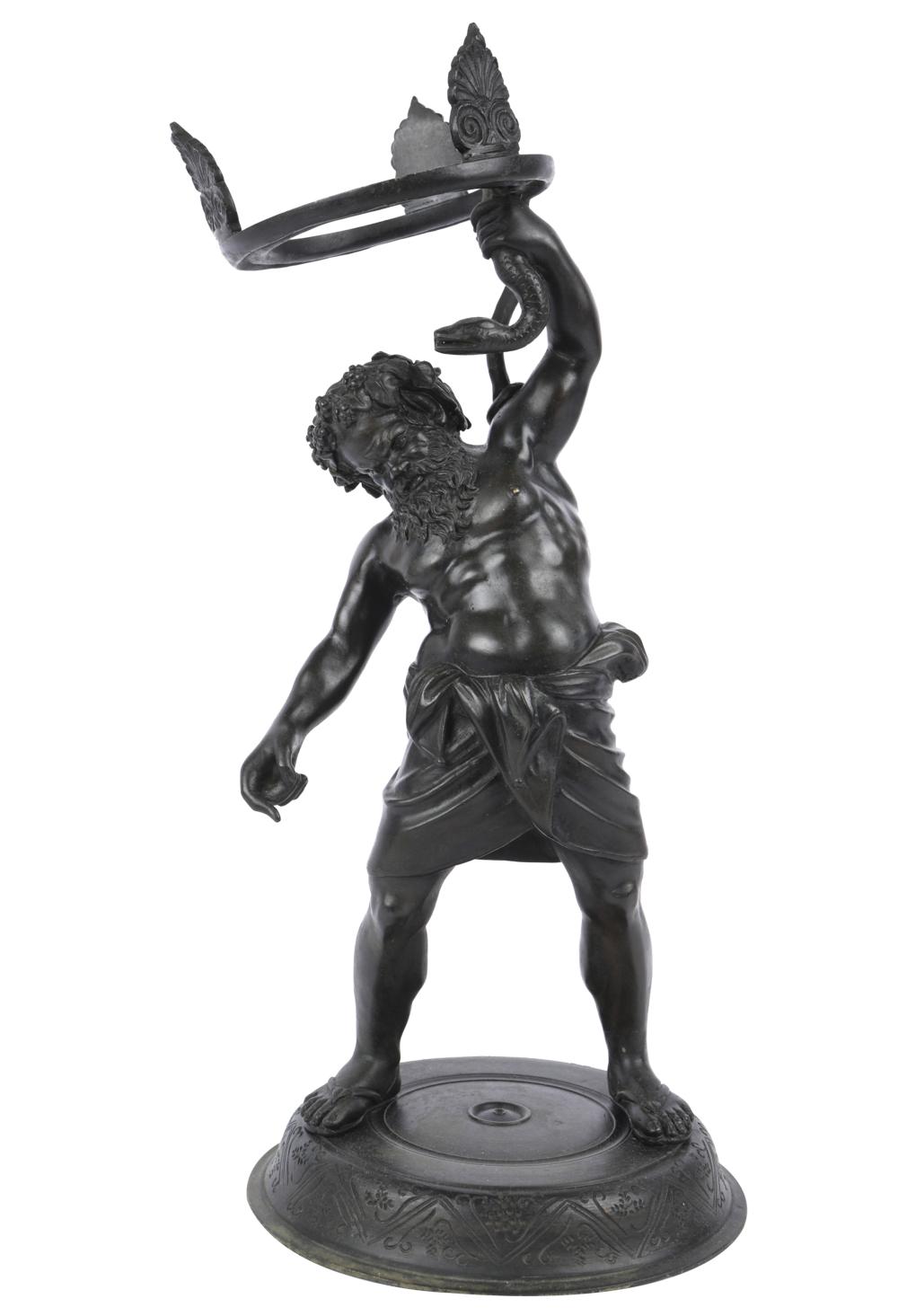BRONZE FIGURE OF A MAN WITH