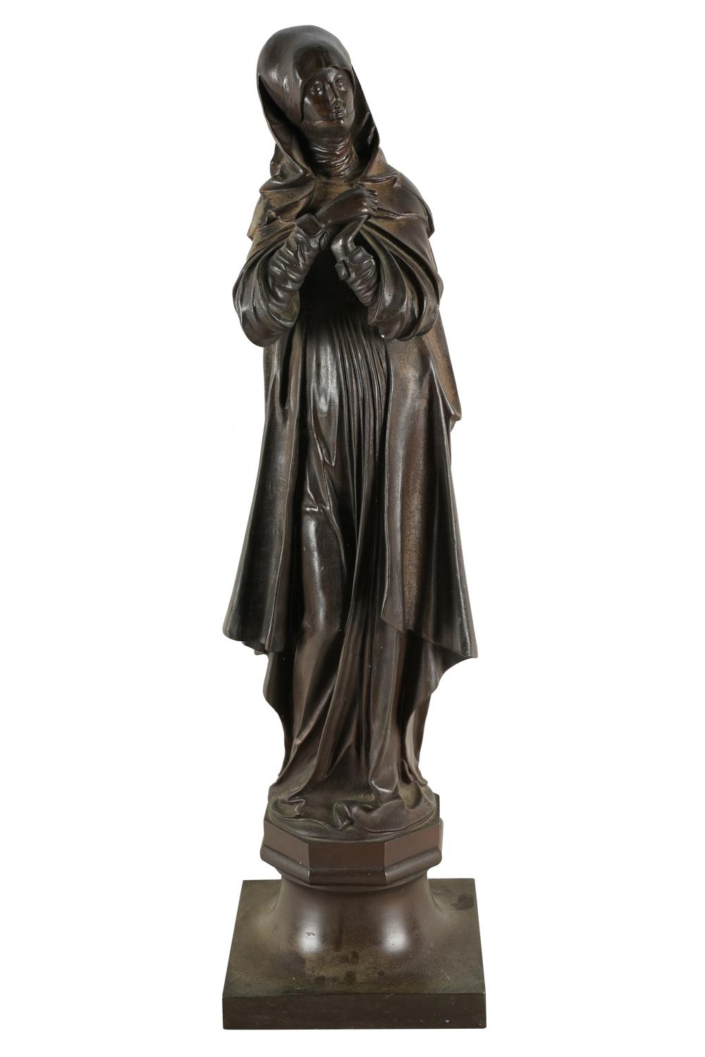 BRONZE FIGURE OF A NUN19th century;