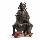 BRONZE FIGURE OF A SEATED AVAL