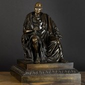 BRONZE FIGURE OF A SEATED DUKE