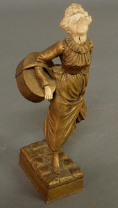 Bronze figure of a woman carry