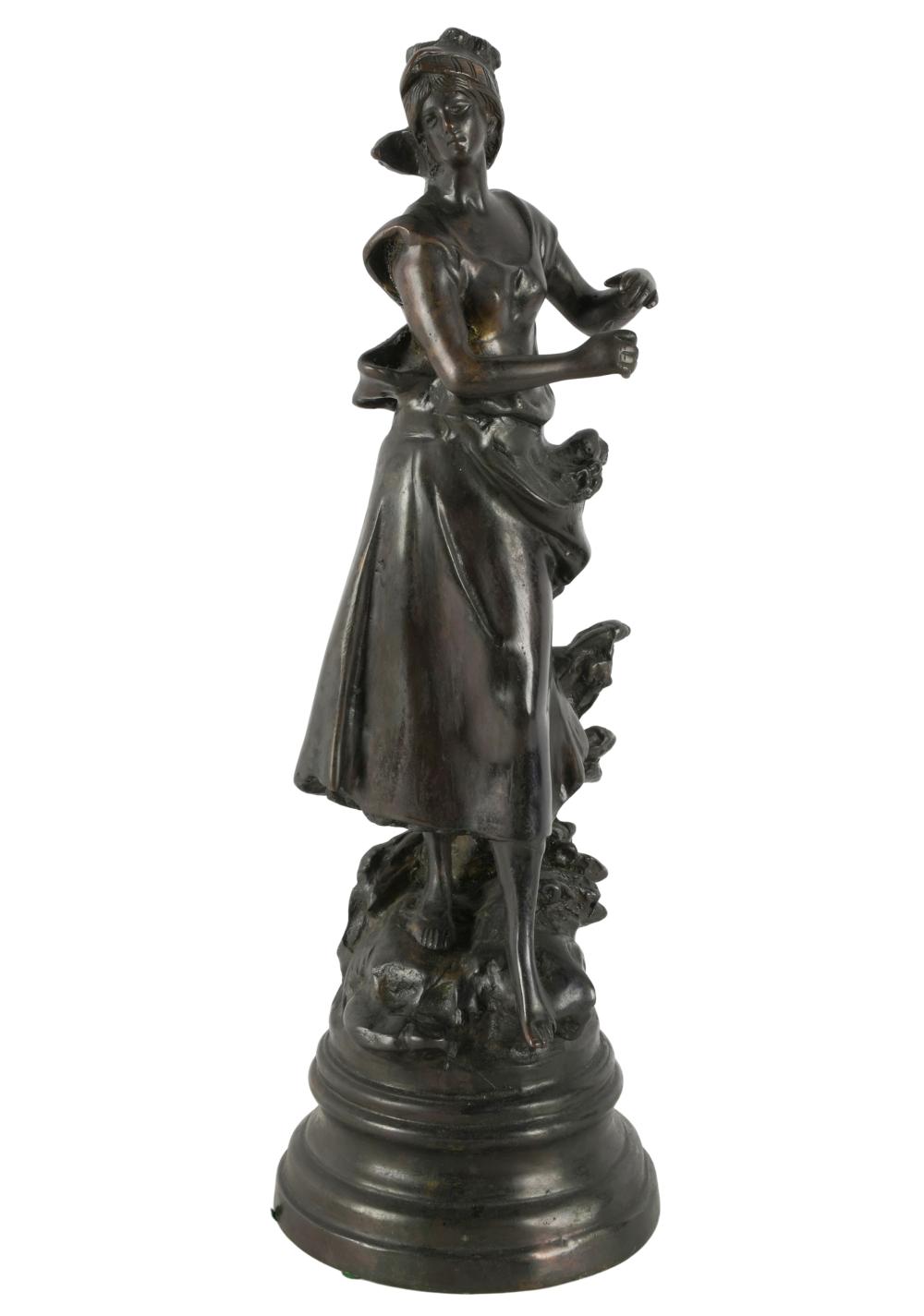 BRONZE FIGURE OF A WOMANunsigned;