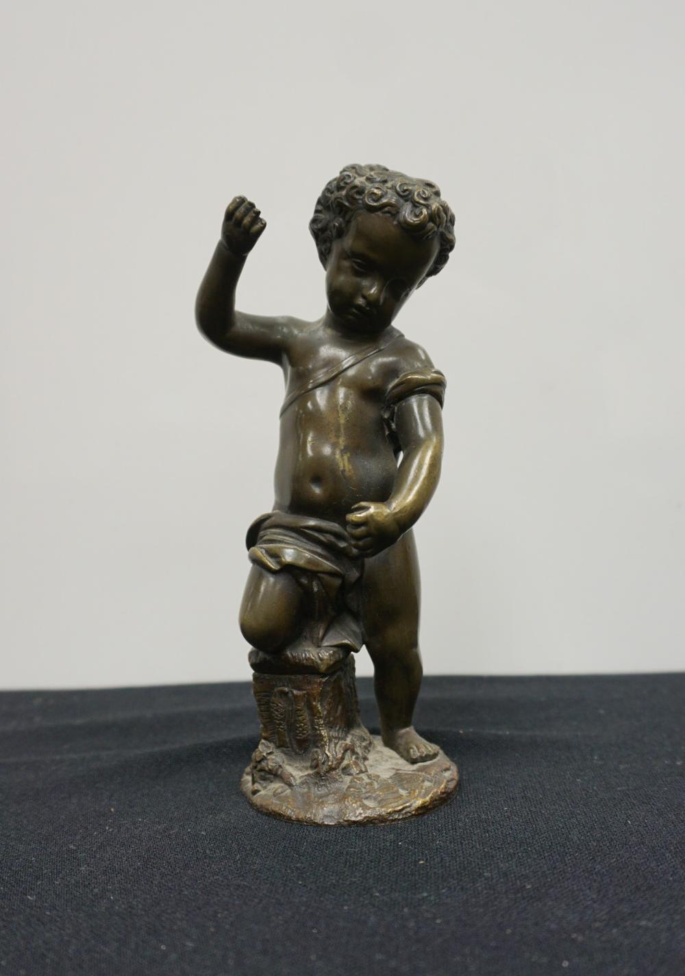 BRONZE FIGURE OF A YOUNG BOY