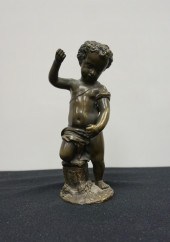 BRONZE FIGURE OF A YOUNG BOY K