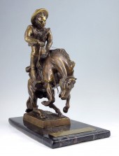 BRONZE FIGURE OF GAUCHO ON A H