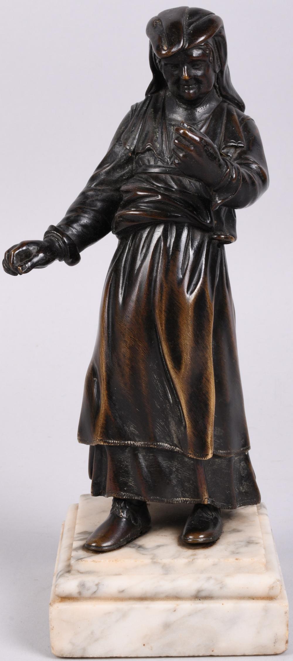 BRONZE FIGURE OF OLD WOMAN,