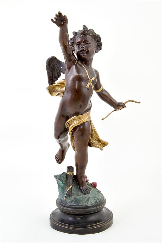 Bronze figure of putto with gilt
