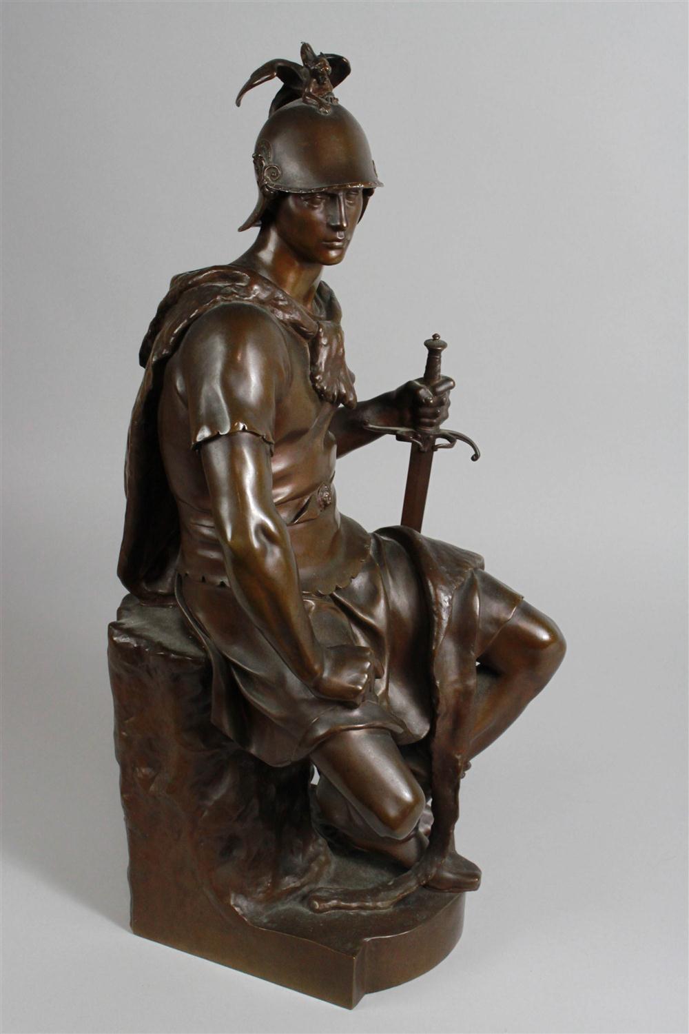 BRONZE FIGURE OF SEATED SOLDIER