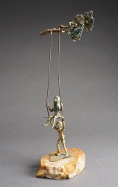 BRONZE FIGURE OF SWINGING CHIL