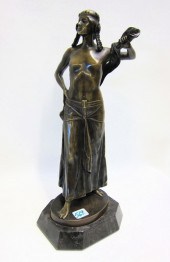BRONZE FIGURE OF WOMAN STANDIN